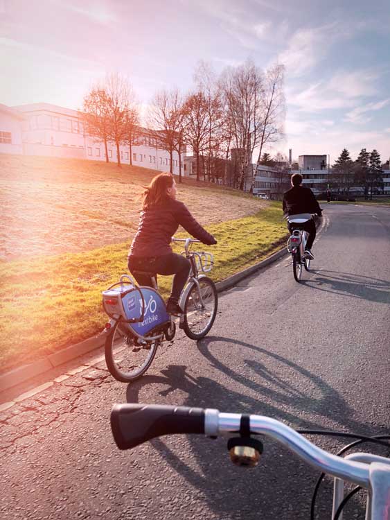 Next Bike - people riding a bike